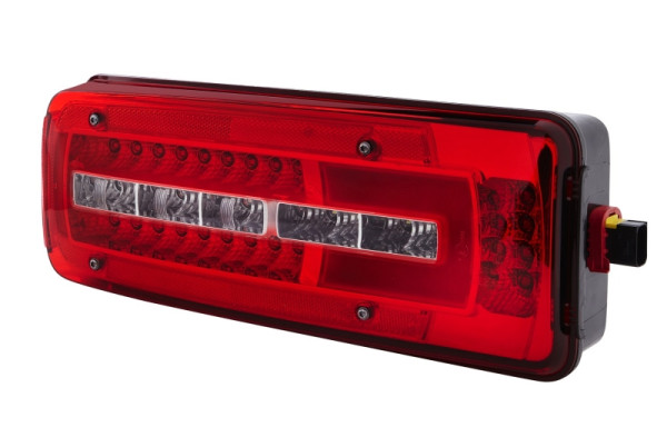 HELLA Heckleuchte, Truck Full LED, LED, 24V, Anbau/geschraubt, ECE/ADR/GGVS, Lichtscheibenfarbe: glasklar/rot, links, 2VD 012 381-211
